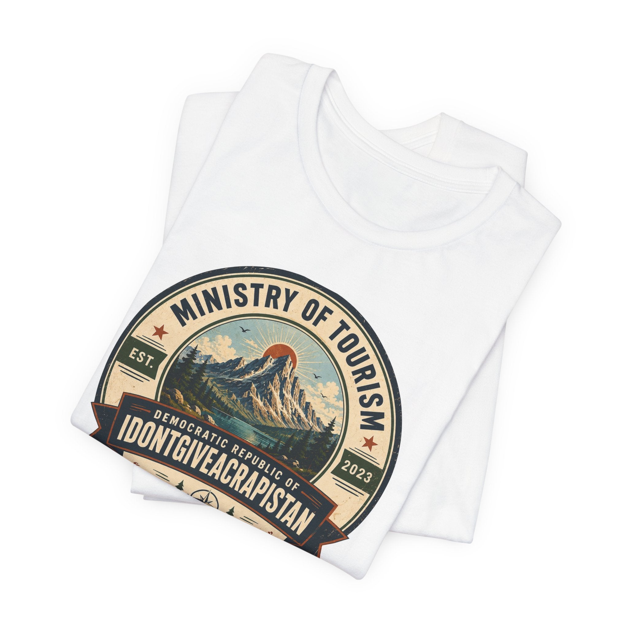 Tourism Badge Tee — "Ministry of Tourism: IDONTGIVEACRAPISTAN" Vintage Mountain T-Shirt